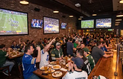 Sports bar projector setup: multi-screen live game viewing